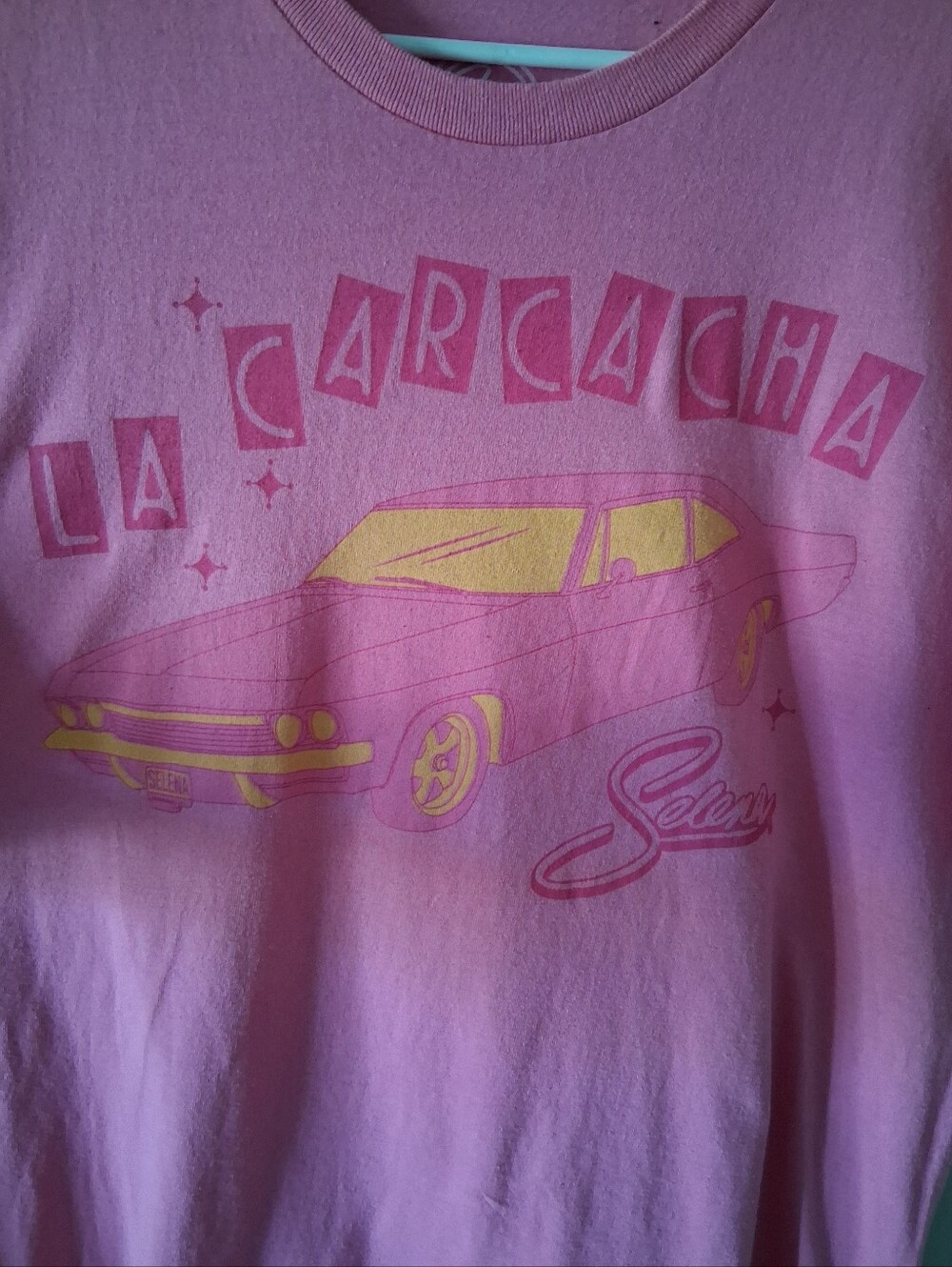 Selena La Carcacha Pink Graphic T-Shirt. Official Selena Apparel.
